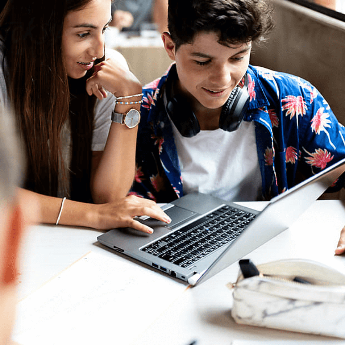 students with laptop