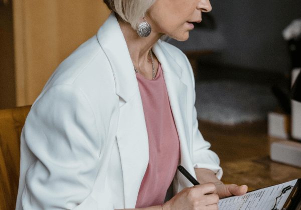 Teacher with clipboard